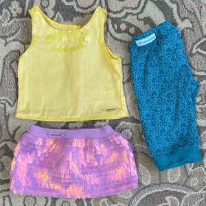 American Girl Truly Me Sequined Sunshine Tank with Pink Skirt & Blue Pants.